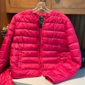 Light and lush never worn quilted jacket. Runs small